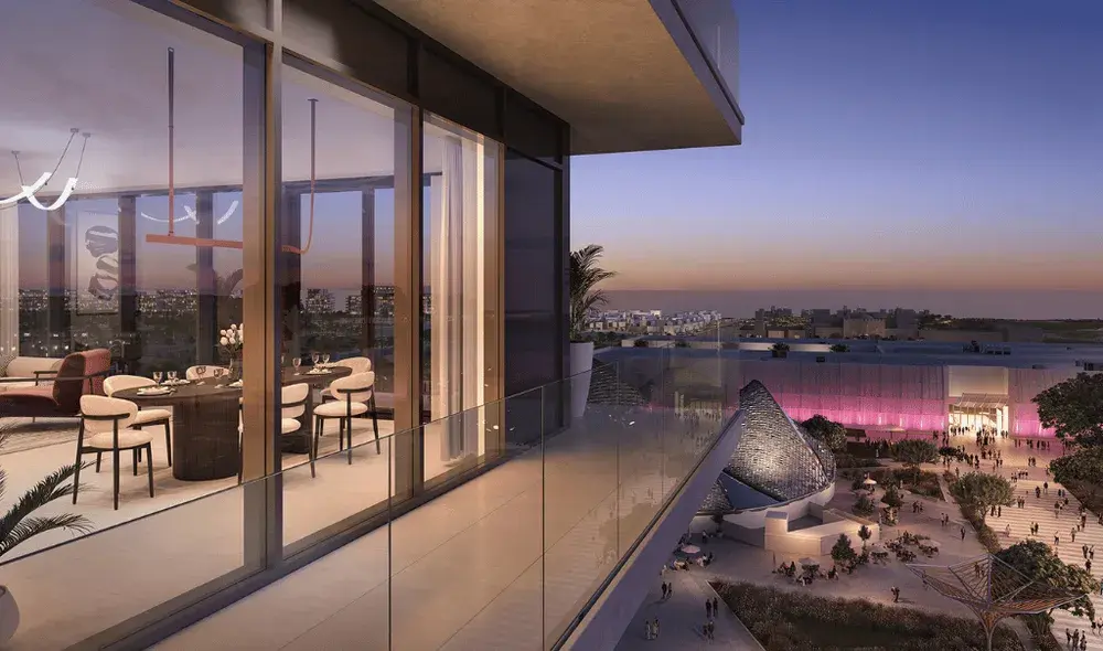 Rooftop pool deck at Manarat Living overlooking Saadiyat Island skyline with leisure terraces, lounge seating and resort-style amenities for residents.